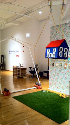 Wide gallery view of the HomeSweetHouse installation.