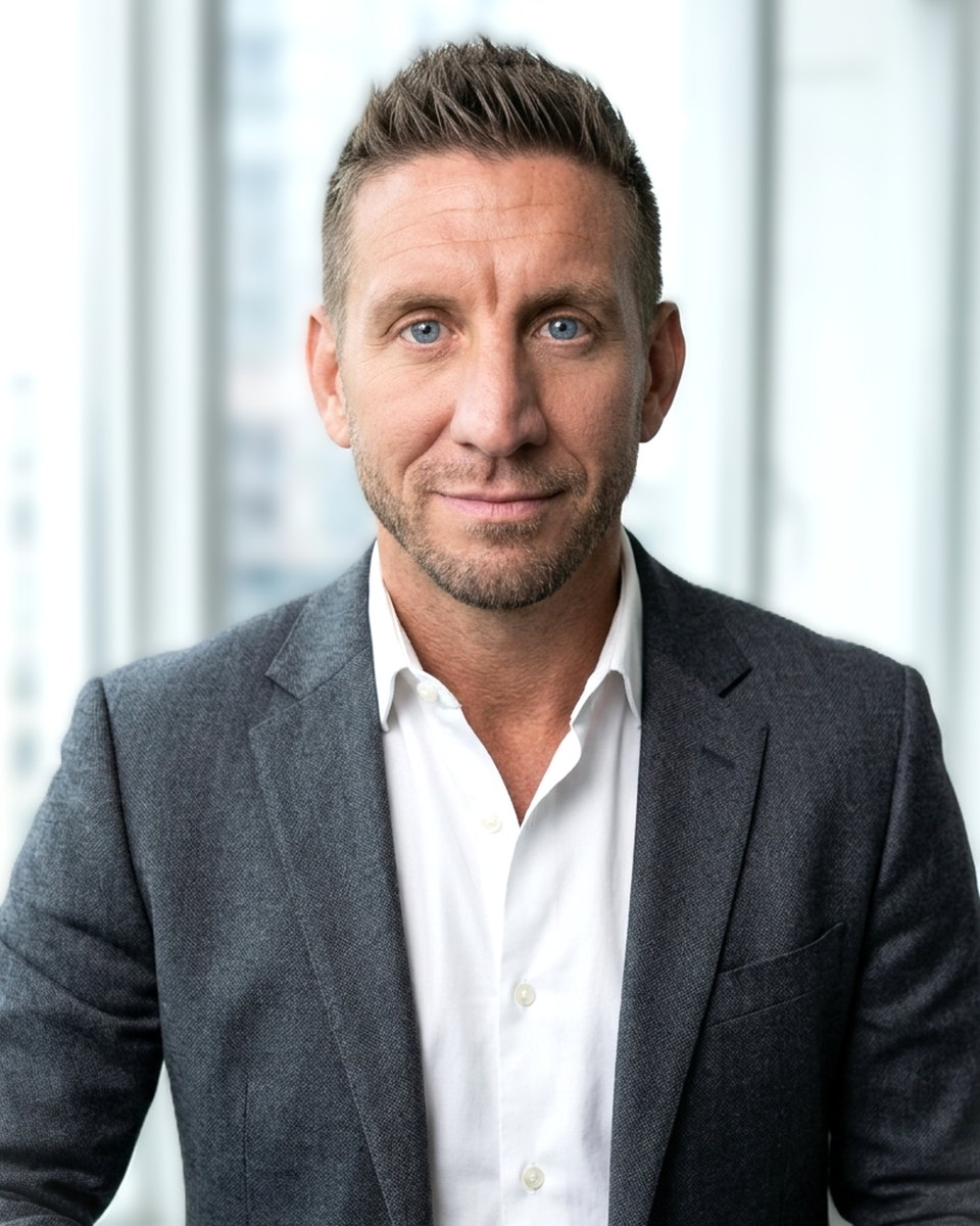 Professional portrait of Dennis Burke.